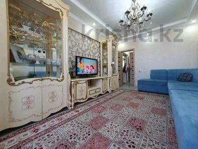 2-комнатная квартира, 55 м², 4/9 этаж, мкр Аксай-3Б 38 за 35.5 млн 〒 в Алматы, Ауэзовский р-н