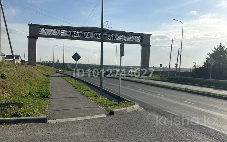 Участок · 25 соток, Отан 1 — Под бизнес Эль-Нур тойханасына напротив касында Гелиос заправкасы бар жана домдар салынып жатыр за 50 млн ₸ в Карасу — фото 2