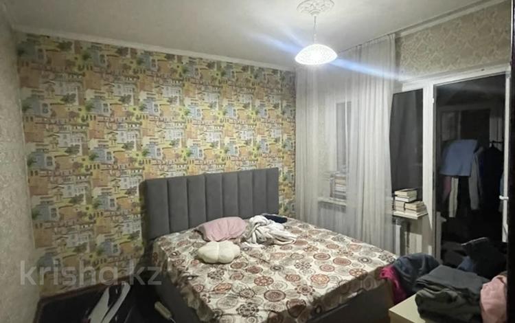 3-комнатная квартира · 65 м² · 1/9 этаж, мкр Аксай-1 2 за 41 млн ₸ в Алматы, Ауэзовский р-н — фото 2