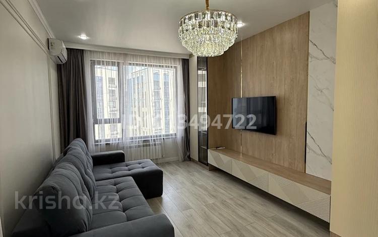 2-комнатная квартира · 56 м² · 11/13 этаж, Кармысова 84/2 за 78 млн ₸ в Алматы, Медеуский р-н — фото 2