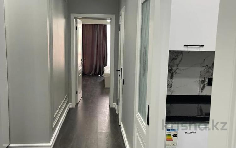 2-комнатная квартира · 54 м² · 13/13 этаж, Толе би 189 — Жарокова за 340 000 ₸ в Алматы, Алмалинский р-н — фото 5