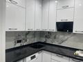 2-комнатная квартира · 54 м² · 13/13 этаж, Толе би 189 — Жарокова за 340 000 ₸ в Алматы, Алмалинский р-н — фото 12