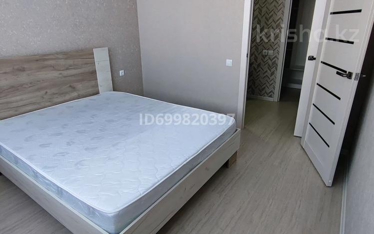 2-комнатная квартира · 55 м² · 3/12 этаж, Тауелсиздик 34/10 за 230 000 ₸ в Астане, Алматы р-н — фото 2