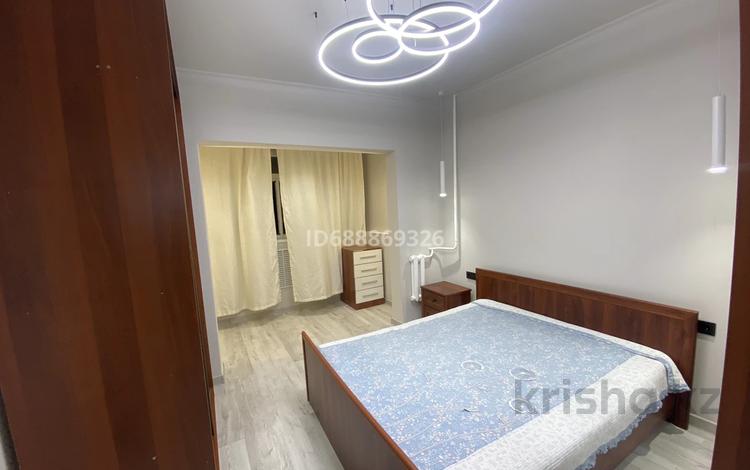 2-бөлмелі пәтер · 56 м² · 4/12 қабат, мкр Таугуль-1 91, бағасы: 300 000 ₸ в Алматы, Ауэзовский р-н — фото 2