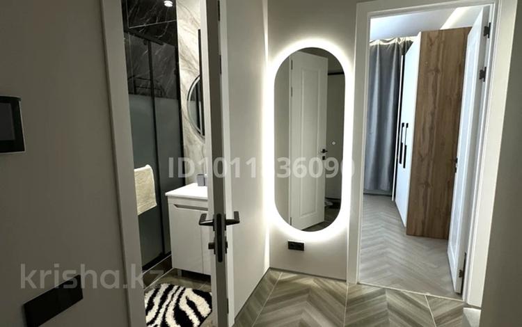 2-комнатная квартира · 46 м² · 5/9 этаж, Просп. Туран 43/5 — Ана мен бала, возле Хан-Шатыра за 23 000 ₸ в Астане, Есильский р-н — фото 2