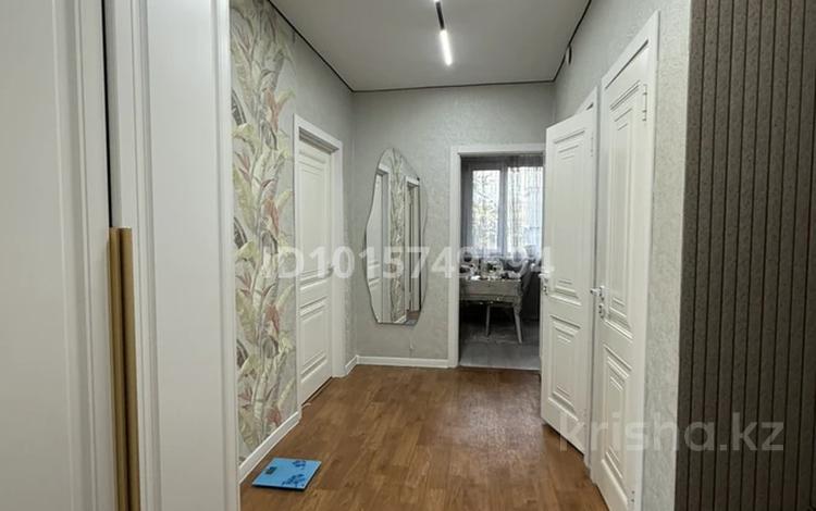 3-комнатная квартира · 68.9 м² · 6/12 этаж, мкр Аксай-1А 10 — Толе би момушылы за 51 млн ₸ в Алматы, Ауэзовский р-н — фото 2