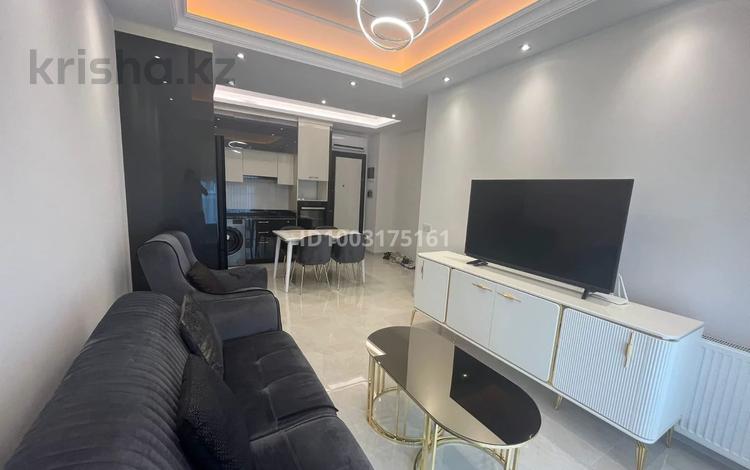 2-комнатная квартира · 65 м² · 4/12 этаж, Mahmutlar, Atatürk Cd. 123 за 300 000 ₸ в Аланье — фото 3