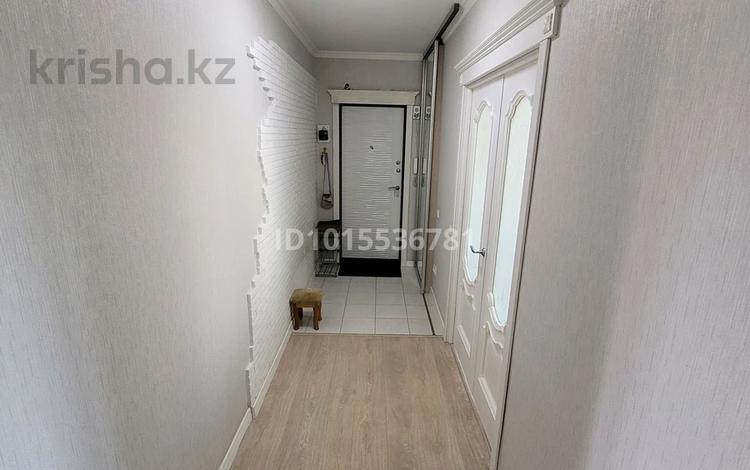 2-комнатная квартира · 67.7 м² · 8/9 этаж, Абая 50 — ТД "Жаннур" за 30 млн ₸ в Астане, р-н Байконур — фото 2
