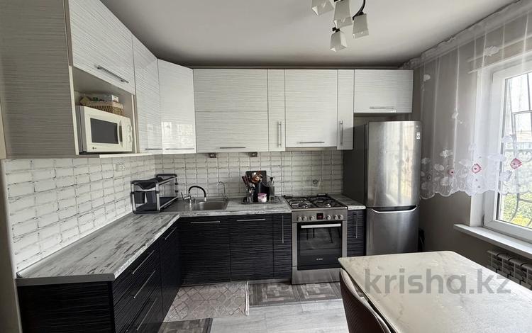 4-комнатная квартира · 84 м² · 5/5 этаж, мкр Аксай-3А 75 за 55 млн ₸ в Алматы, Ауэзовский р-н — фото 34