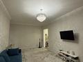2-комнатная квартира · 65 м² · 12/12 этаж, Тургут Озала за 380 000 ₸ в Алматы, Алмалинский р-н — фото 8