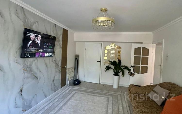 3-бөлмелі пәтер · 74 м² · 1/5 қабат, Мкр 2 34, бағасы: 30 млн ₸ в Конаеве — фото 2