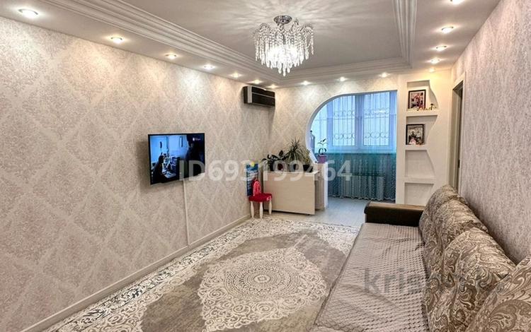 4-комнатная квартира, 84 м², 4/5 этаж, мкр Мамыр-2 8 за 57 млн 〒 в Алматы, Ауэзовский р-н — фото 2