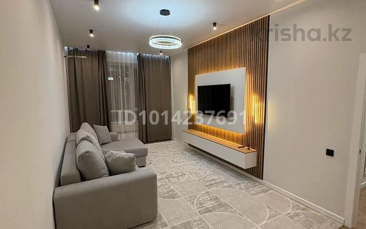 2-комнатная квартира · 64 м² · 5/12 этаж, Туран 34б за 400 000 ₸ в Астане, Нура р-н — фото 2