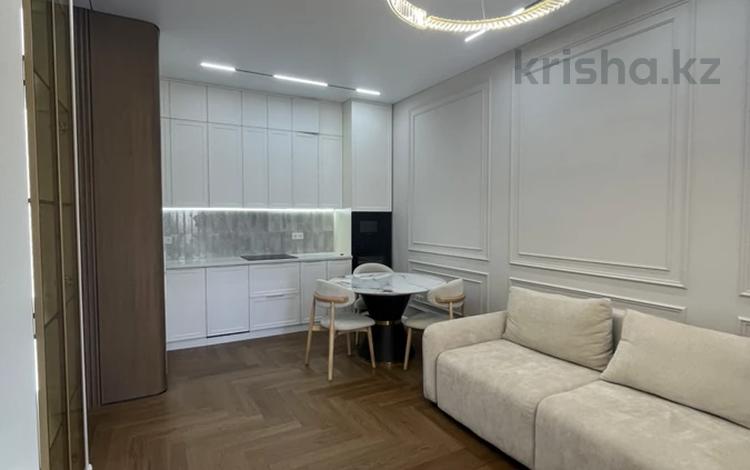 2-бөлмелі пәтер · 60 м² · 10/16 қабат, Абая 165 — Тургут Озала, бағасы: 75 млн ₸ в Алматы, Алмалинский р-н — фото 2