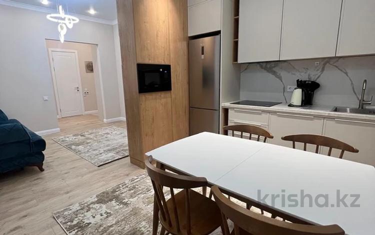 2-комнатная квартира · 50 м² · 3/9 этаж, Толе би 52 за 390 000 〒 в Астане, Есильский р-н — фото 2