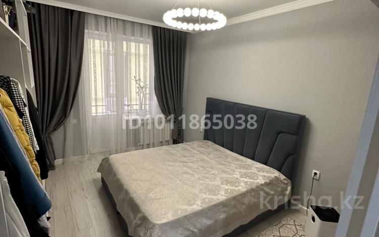 1-комнатная квартира · 50 м² · 5/12 этаж, ул. Ханов Керея и Жанибека 30Б за 40 млн ₸ в Астане, Есильский р-н — фото 2