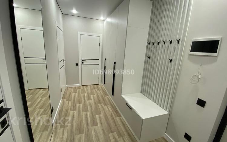 2-комнатная квартира · 50 м² · 13/13 этаж, Толе би 189/3 — Толе би за 350 000 ₸ в Алматы, Алмалинский р-н — фото 2