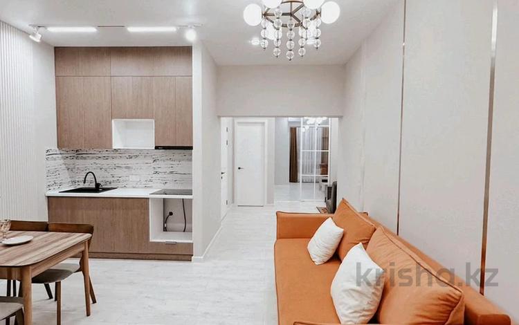 2-комнатная квартира · 70 м² · 10/20 этаж, Гагарина 310 за 65 млн ₸ в Алматы, Бостандыкский р-н — фото 2
