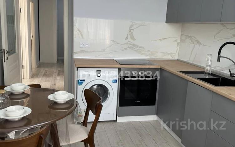 2-комнатная квартира · 65 м² · 6/13 этаж, Навои 210/2 за 410 000 ₸ в Алматы, Бостандыкский р-н — фото 2