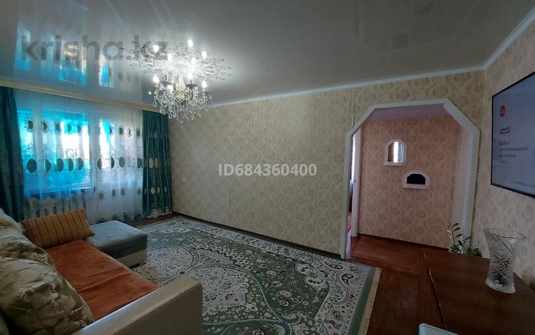 3-комнатная квартира, 57 м², 5/5 этаж, Самал за 16 млн 〒 в Талдыкоргане, мкр Самал — фото 2