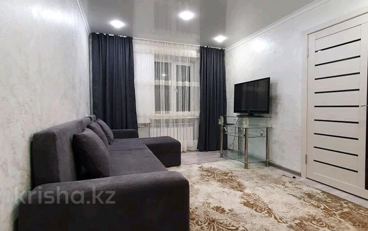 2-комнатная квартира, 76 м², 3/3 этаж посуточно, 1й мкр 50 за 9 000 〒 в Талдыкоргане — фото 2