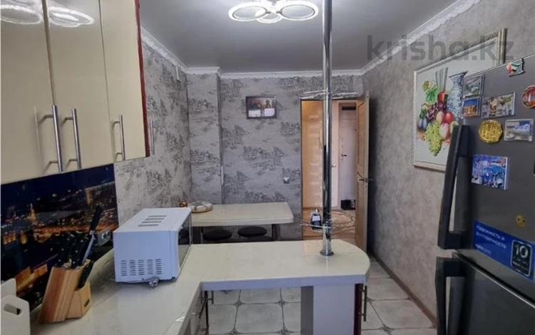 4-комнатная квартира · 90 м² · 5/9 этаж, мкр Юго-Восток, Дюсембекова 4 за 30 млн ₸ в Караганде, Казыбек би р-н — фото 2