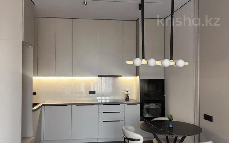 2-комнатная квартира · 46 м² · 5/12 этаж, Тургут Озала 194 за 46.5 млн ₸ в Алматы, Бостандыкский р-н — фото 2