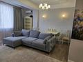 2-комнатная квартира · 80 м² · 6/13 этаж, микрорайон Керемет за 77 млн ₸ в Алматы, Бостандыкский р-н — фото 2