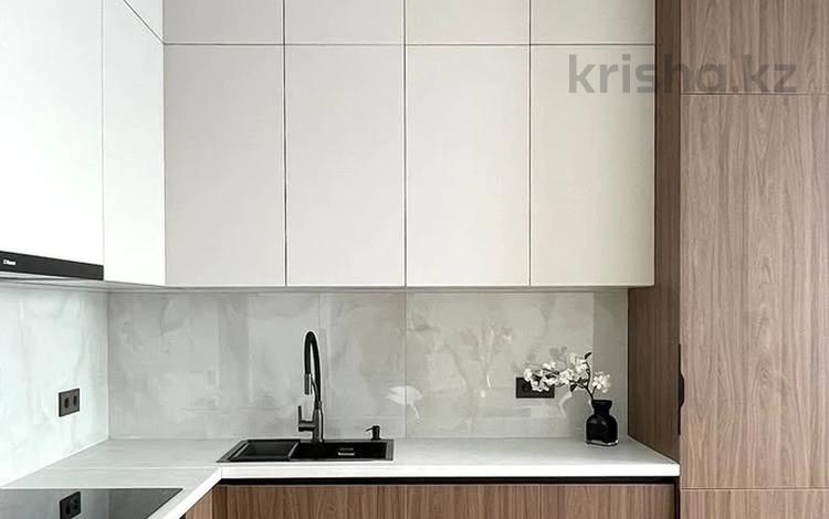 2-комнатная квартира · 45 м² · 10/13 этаж, Досмухамедова 83 за 63.5 млн ₸ в Алматы, Алмалинский р-н — фото 2